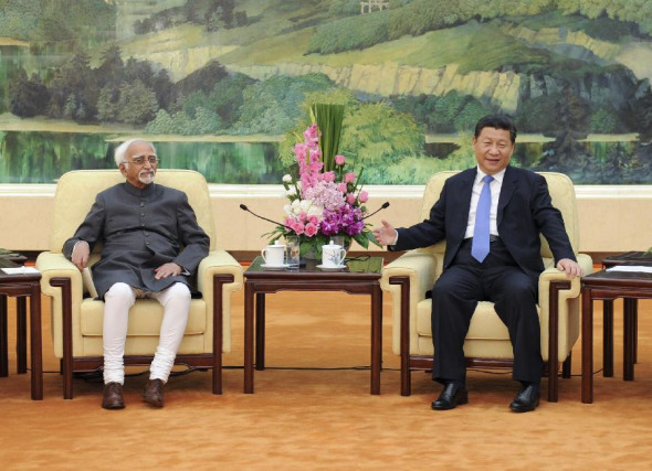 Chinese President Xi Jinping (R) meets with Indian Vice President Mohammad Hamid Ansari in Beijing, China, June 30, 2014. (Xinhua/Zhang Duo)