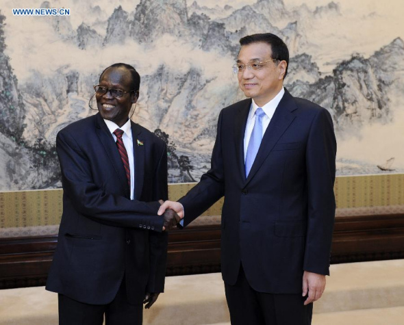Chinese Premier Li Keqiang (R) meets with South Sudanese Vice President James Wani Igga, who is also deputy chairman of the Sudan People's Liberation Movement (SPLM), in Beijing, capital of China, July 1, 2014. (Xinhua/Zhang Duo) 