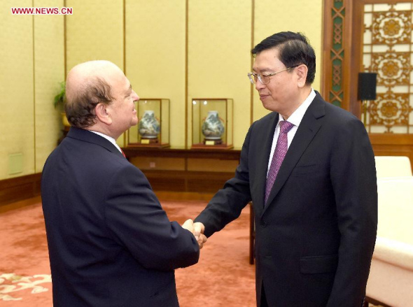 Zhang Dejiang (R), chairman of the Standing Committee of China's National People's Congress, meets with Jean Besson, chairman of the French Parliament's France-China Friendship Group, in Beijing, China, July 1, 2014. (Xinhua/Ma Zhancheng) 