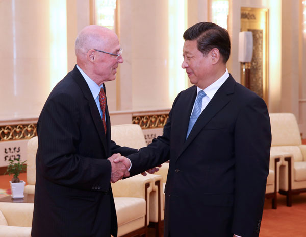 Chinese President Xi Jinping (R) meets with former US treasury secretary Henry Paulson in Beijing, capital of China, July 2, 2014. [Photo/Xinhua]