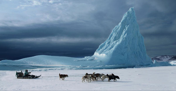 A dog sled in North Greenland typifies life in the Arctic, where temperatures are rising. Wang Jiannan / for China Daily