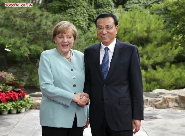 Chinese Premier Li Keqiang (R) meets with German Chancellor Angela Merkel in Beijing, capital of China, July 6, 2014. (Xinhua/Pang Xinglei)