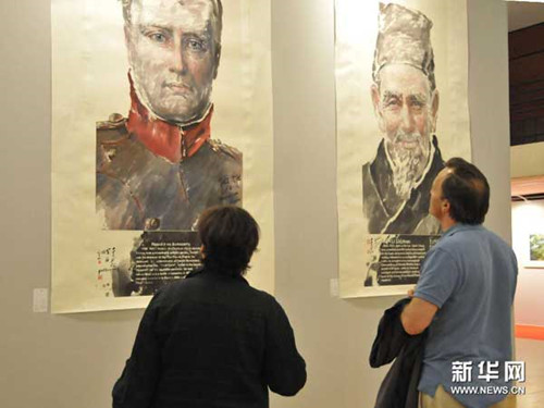 An art exhibition featuring Chinese calligraphy, paintings and contemporary works is on show at the Louvre Museum.