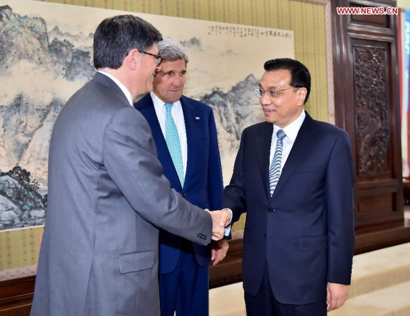 Chinese Premier Li Keqiang (R) meets with US Secretary of State John Kerry (C) and Treasury Secretary Jacob Lew (L) in Beijing, capital of China, July 10, 2014. John Kerry and Jacob Lew came here to attend the Sixth Round of China-U.S. Strategic and Economic Dialogue and the Fifth Round of China-US High-Level Consultation on People-to-People Exchange. (Xinhua/Li Tao)