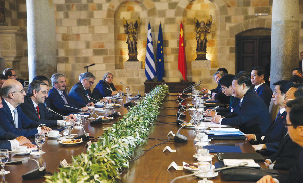 Chinese President Xi Jinping meets with Greek Prime Minister Antonis Samaras on the Rhodes Island in Greece, July 13, 2014. [Photo/Xinhua]