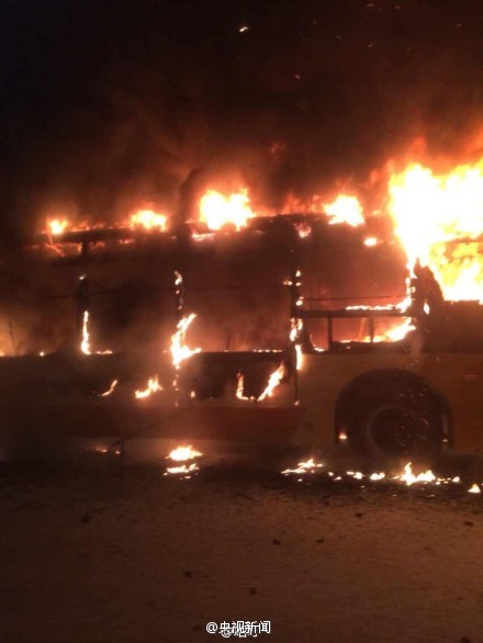 A bus catches fire in an explosion Tuesday evening in Guangzhou, Guangdong province. [Photo/Sina Weibo account of CCTV]