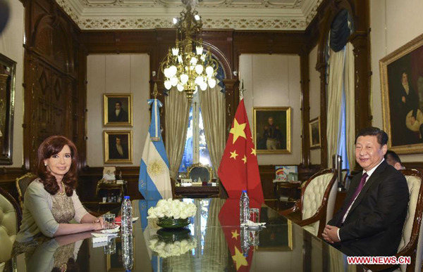 Chinese President Xi Jinping (R) holds talks with Argentine President Cristina Fernandez de Kirchner in Buenos Aires, Argentina, July 18, 2014. Xi and his Argentine counterpart, Cristina Fernandez de Kirchner, agreed here Friday to upgrade bilateral ties to a comprehensive strategic partnership. (Xinhua/Li Xueren)