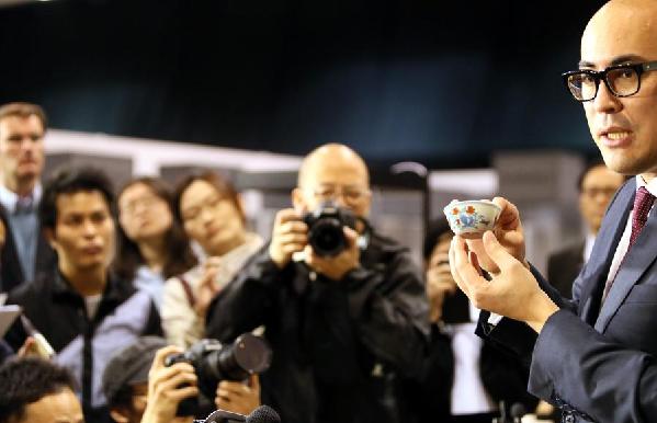 A chicken cup from the Ming Dynasty (1368-1644) fetches HK$281 million ($36 million) to set a new record for a piece of Chinese porcelain sold at auction at Sotheby's spring sale in Hong Kong on Tuesday. [Photo/Xinhua]