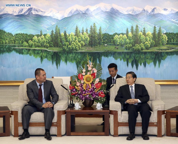 Chinese State Councilor and Minister of Public Security Guo Shengkun (R) meets with Rustam Mamasadykov, vice chairman of the State Committee on National Security of Kyrgyzstan, in Beijing, capital of China, July 22, 2014. (Xinhua/Pang Xinglei)