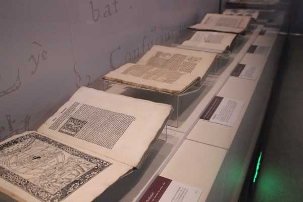 Old books published in foreign languages are one of the highlights at the National Museum of Classic Books'opening exhibition. [Photo by Wang Kaihao / China Daily]