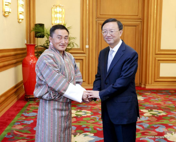 Chinese State Councilor Yang Jiechi (R) meets with Bhutanese Foreign Minister Rinzin Dorje in Beijing, China, July 28, 2014. (Xinhua/Zhang Duo)