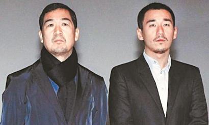 Chinese actor and director Zhang Guoli(L) and his actor son Zhang Mo [File photo]