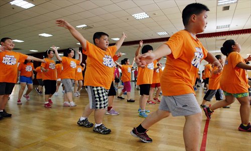 Overweight and obese children go to fitness camp to lose weight. Photo: Courtesy of Feng Lei