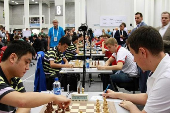 China's men defeated Poland in the final round in Tromso, Aug 14, 2014. [Photo/People's Daily]  