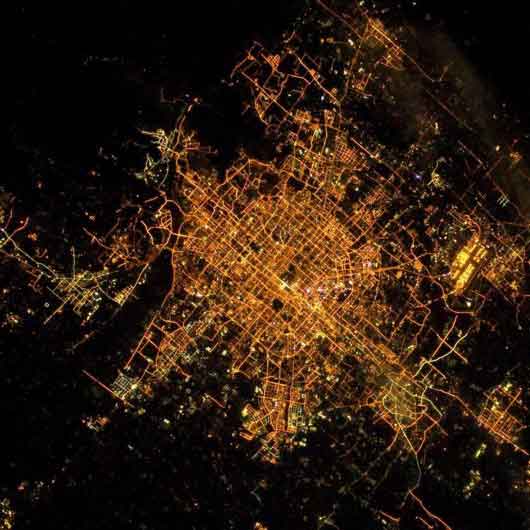 NASA astronaut Reid Wiseman has tweeted a photo of Beijing after dark, with lights sparkling all over the capital.