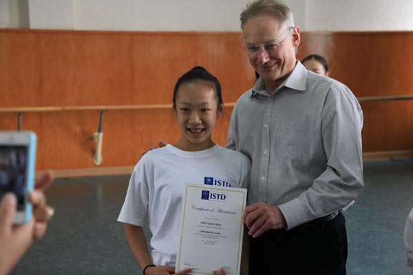 ISTD chairman Christopher Bannerman with student Zhou Qianqian.