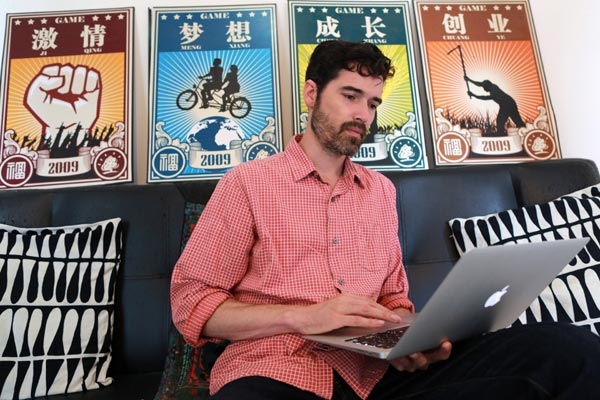 Computer programmer Joshua Dyer has built a career in China helping the country's online and mobile game companies translate their products into English. Feng Yongbin/ China Daily