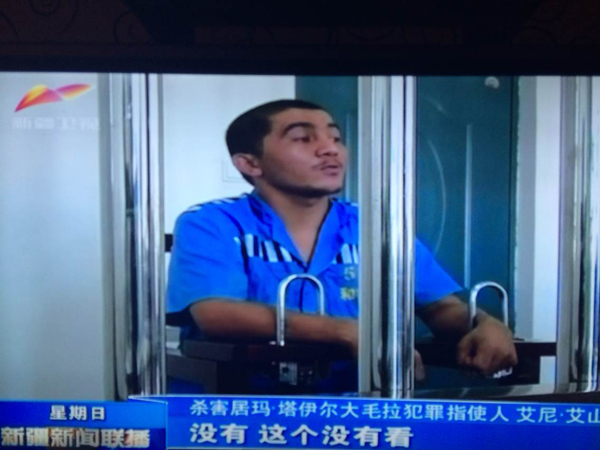 A TV screen grab from Xinjiang TV broadcast on Sunday shows Aini Aishan, 18, is under interrogate.   [Photo/chinadaily.com.cn]