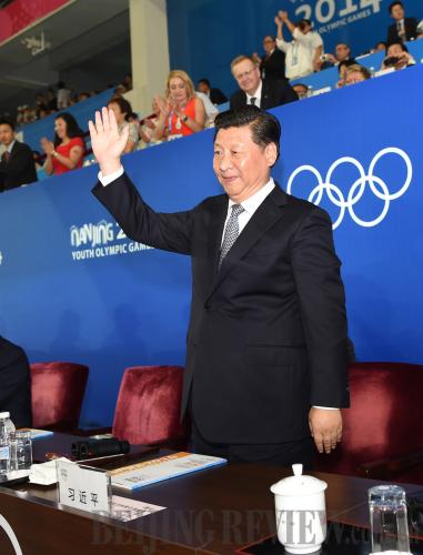 WELCOME ATHLETES: Chinese President Xi Jinping attends the opening ceremony of the Nanjing Youth Olympics on August 16 (MA ZHANCHENG)