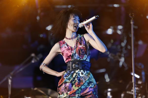 Chinese actress Maggie Cheung performs at the Strawberry Music Festival. Photo provided to China Daily