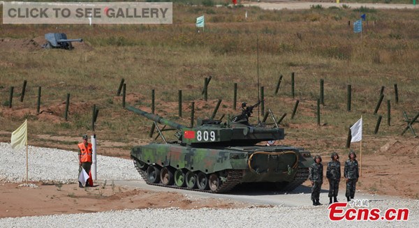 China's Type 96A main battle tank is seen at the tank biathlon championship in the Alabino firing range of Moscow region, Russia on August 4, 2014. [Photo: China News Service / Jia Jingfeng]