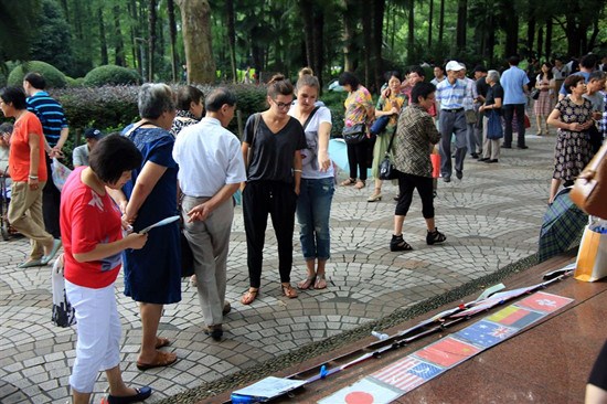 Matchmaking information is on display at Peoples Park yesterday. — Zhang Suoqing 