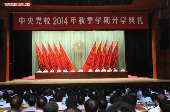 Liu Yunshan (C, rear), member of the Standing Committee of the Political Bureau of the Communist Party of China (CPC) Central Committee and president of the Party School of the CPC Central Committee, addresses the opening ceremony of the school's 2014 fall semester in Beijing, capital of China, Sept 1, 2014. (Xinhua/Rao Aimin) 