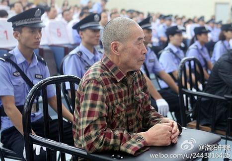 Hu Wanlin sits during his trial yesterday at the Luoyang Intermediate Peoples Court in Henan Province. (Photo: Sina Weibo)