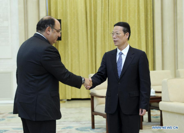 Chinese Vice Premier Zhang Gaoli (R) meets with participants for the meeting of Like Minded Developing Countries (LMDC) group on climate change, in Beijing, China, Sept. 3, 2014. (Xinhua/Zhang Duo)