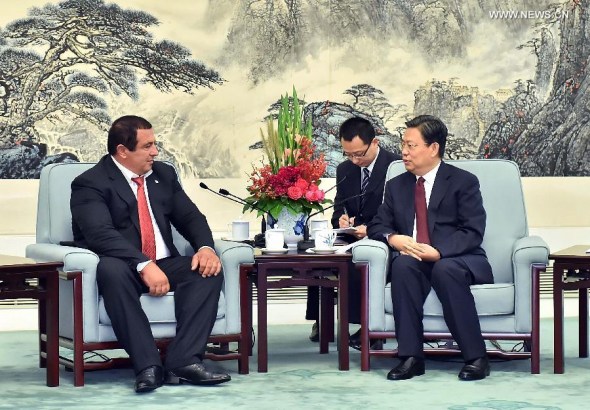 Zhao Leji (R), a member of the Political Bureau of the Communist Party of China(CPC) Central Committee, who is also head of the Organization Department of the CPC Central Committee, meets with a Prosperous Armenia Party delegation led by Gagik Tsarukian in Beijing, China, Sept. 3, 2014. (Xinhua/Li Tao)