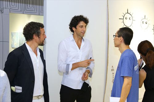 Director of BANK Mathieu Borysevicz talks to guests at the opening ceremony of Art in the City. Photo: Courtesy of Effie Sui