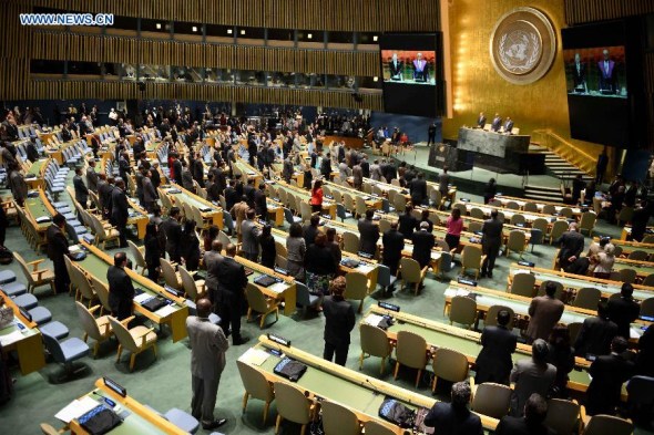 Participants observe a moment of meditation during the first plenary meeting of the 69th session of the UN General Assembly, at the UN headquarters in New York, on Sept. 16, 2014. The UN General Assembly started its 69th session at the UN Headquarters in New York on Tuesday. (Xinhua/Niu Xiaolei) 