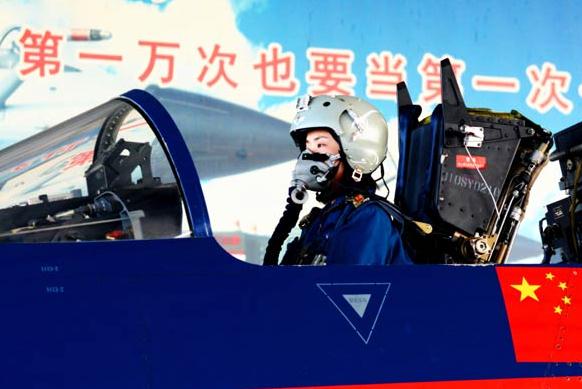 A female fighter pilot takes part in training at the PLA August 1st Air Demonstration Team base in Tianjin on Tuesday. Zhang Pengyan / for China Daily  