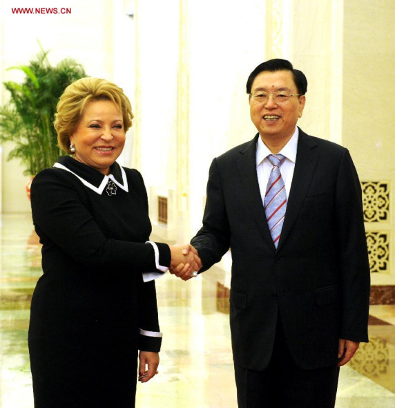Zhang Dejiang (R), chairman of the Standing Committee of China's National People's Congress, meets with Valentina Matviyenko, chairperson of Russia's Federal Assembly, in Beijing, capital of China, Sept. 23, 2014. (Xinhua/Rao Aimin)