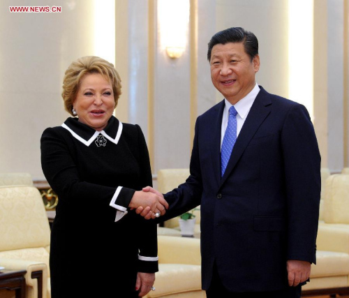 Chinese President Xi Jinping (R) meets with Valentina Matviyenko, chairperson of Russia's Federal Assembly, in Beijing, capital of China, Sept. 23, 2014. (Xinhua/Rao Aimin)