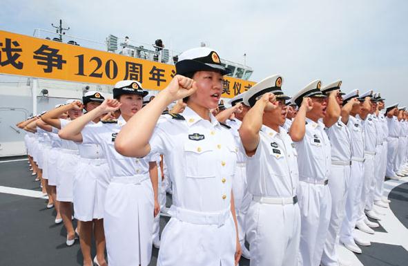 Sailors on a PLA navy cruiser take an oath on Aug 27 off the coast of Weihai, Shandong province. That day marked the 120th year of the start of the First SinoJapanese War (also called the Jiawu War) in 1894. The PLA navy, for the first time in its history, held a maritime memorial ceremony. CHA CHUNMING / XINHUA 