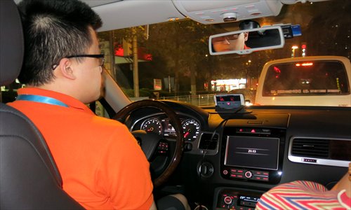 Chen Aoliang drives a customer home. Photo: Du Qiongfang/GT