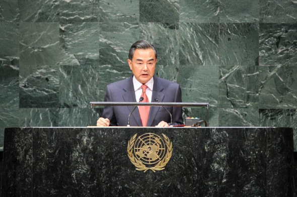 Chinese Foreign Minister Wang Yi speaks during the general debate of the 69th session of the United Nations General Assembly, at the UN headquarters in New York, on Sept. 27, 2014. (Xinhua/Niu Xiaolei)