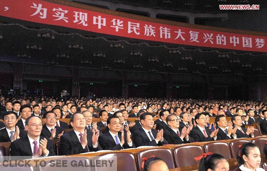 Chinese President Xi Jinping and other leaders including Premier Li Keqiang, Zhang Dejiang, Yu Zhengsheng, Liu Yunshan, Wang Qishan and Zhang Gaoli attend a concert that is held to celebrate the 65th anniversary of the founding of the People's Republic of China on Monday. (Xinhua photo) 