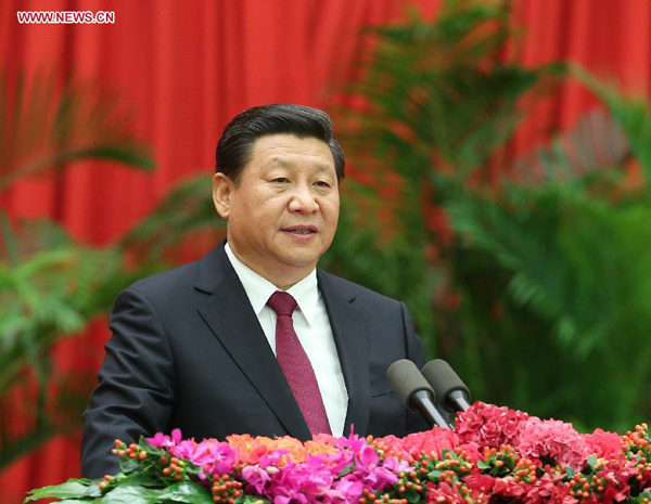 Chinese President Xi Jinping delivers a speech on behalf of the Communist Party of China Central Committee and the State Council at the reception celebrating the 65th anniversary of the founding of the People's Republic of China, in Beijing, China, Sept. 30, 2014. (Xinhua/Pang Xinglei)
