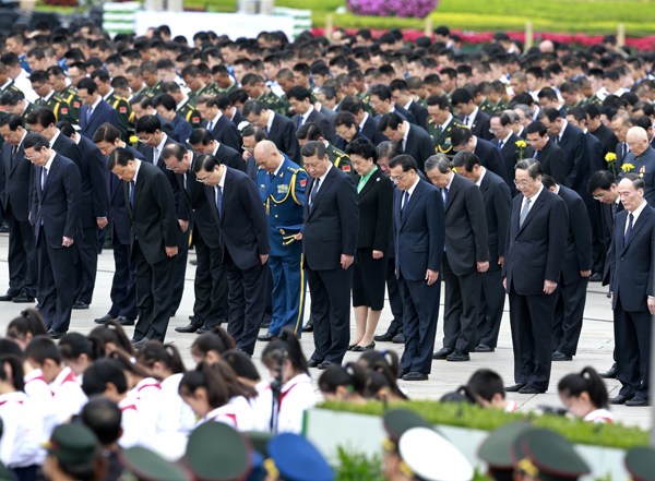 Chinese leaders pay tribute to those who died for the country on its first Martyrs' Day on Tuesday at Tian'anmen Square in Beijing. Martyrs, as defined by the government, are people who sacrificed their lives for national independence and prosperity, as well as the welfare of the people in modern times. Feng Yongbin / China Daily