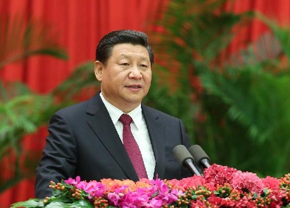 Chinese President Xi Jinping delivers a speech on behalf of the Communist Party of China Central Committee and the State Council at the reception celebrating the 65th anniversary of the founding of the People's Republic of China, in Beijing, Sept 30, 2014. [Photo/Xinhua]