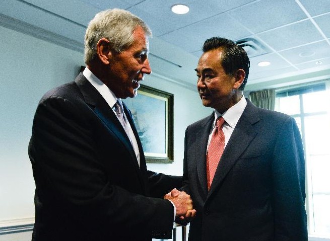 Chinese Foreign Minister Wang Yi (R) meets with U.S. Defense Secretary Chuck Hagel in Washington D.C. , the United States, on Oct. 1, 2014. (Xinhua/Bao Dandan)
