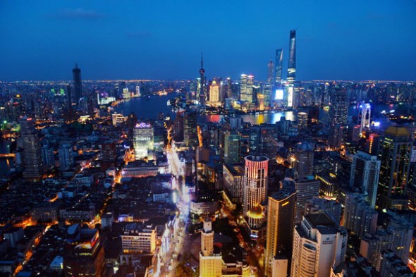 A night view of Lujiazui, the financial district in Shanghai. China will have six of the world's top 10 skyscrapers by 2020, according to Council on Tall Buildings and Urban Habitat. [Lai Xinlin / China Daily]
