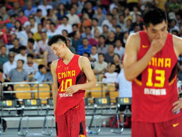 China mens basketball team finishes a disappointing fourth at the Asian Cup in Wuhan, Hubei province. XIAO YIJIU / XINHUA 
