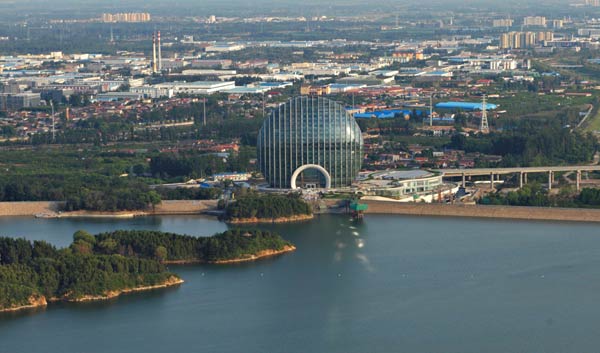 Scene of key buildings for the 2014 APEC meeting on an islet on Yanqi Lake in Huairou district in Beijing, including an international center, a boutique hotel and villas.  For China Daily  