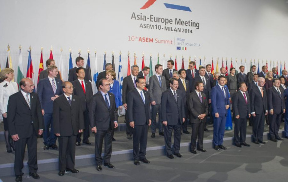 Leaders attending the 10th Asia-Europe Meeting (ASEM) Summit pose for a group photo in Milan, Italy, Oct. 16, 2014. Chinese Premier Li Keqiang (4th L, front) attended the opening of the ASEM Summit on Thursday. (Xinhua/Xie Huanchi)