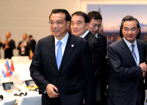 Premier Li Keqiang attends the closing ceremony of the Asia-Europe Meeting in Milan, Italy, on Thursday. Rao Aimin / Xinhua