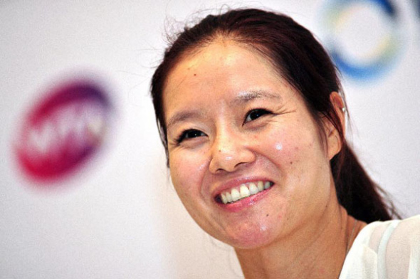 China's former tennis player Li Na attends the press conference for the Women's Tennis Association (WTA) Finals in Singapore's Art Science Museum on Oct. 19, 2014. (Xinhua/Then Chih Wey)