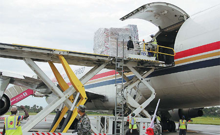 uipment and materials for a mobile laboratory from China arrive at the airport in Freetown, Sierra Leone. Xinhua